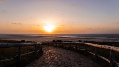 Sunset on the path to the lighthouse