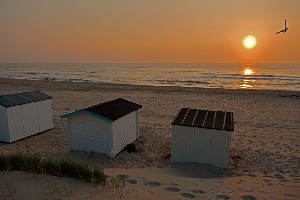 Zonsondergang aan zee