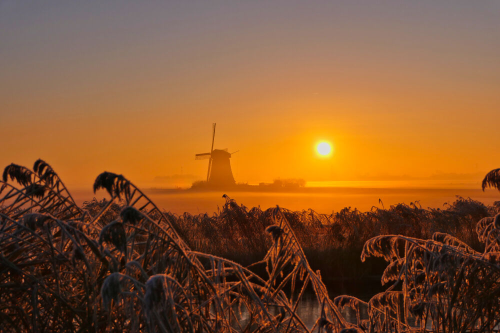 Zonsopkomst op een winterse ochtend in Zuidschermer