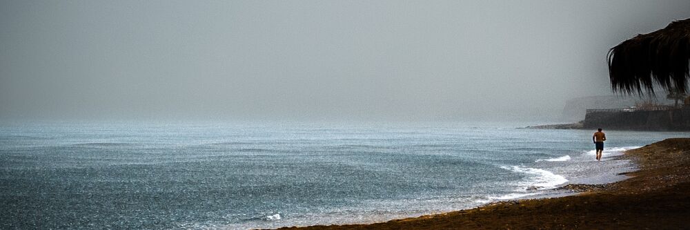 Running along the sea