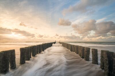 Fine Art landschap van een sfeervolle zonsondergang op het strand van Domburg