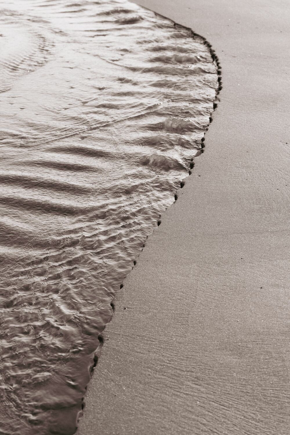 "Zeit gezeichnet in Sand und Meer"