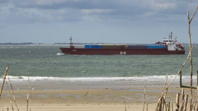 Ship sails along Vlissingen coast