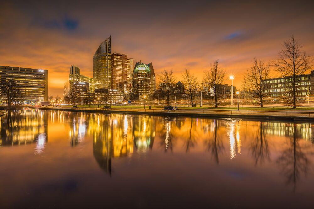 The Hague skyline at night and reflections in the water