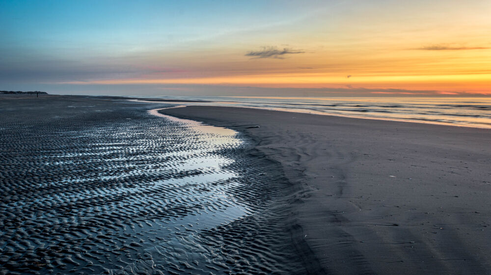 Zonsondergang op het strand