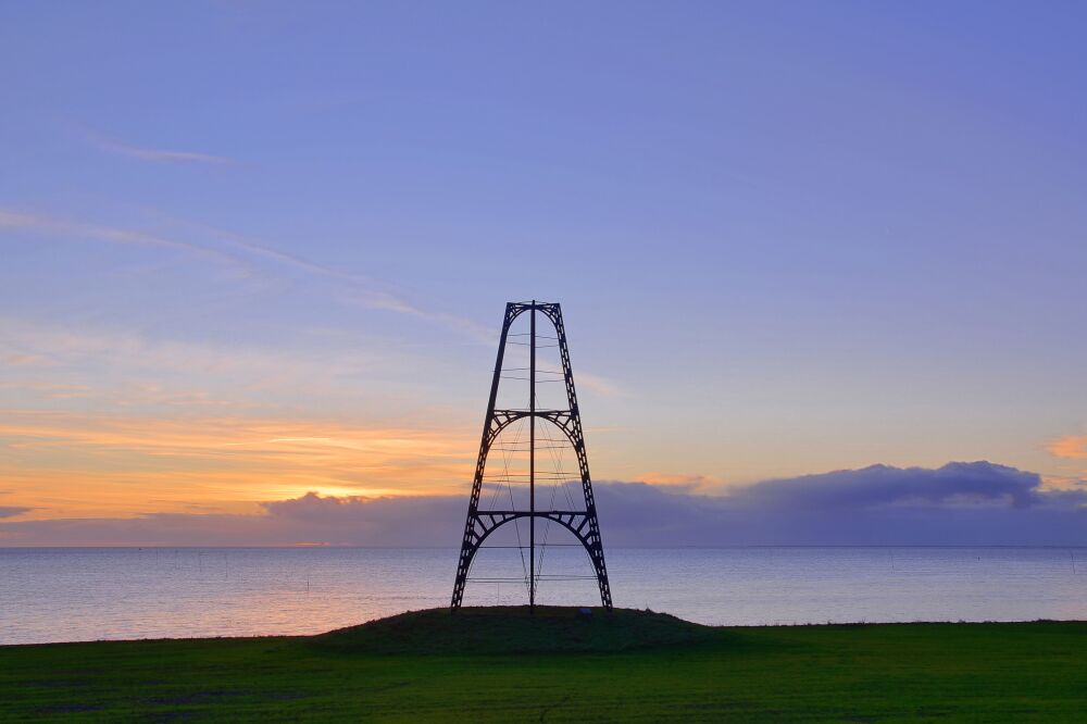 Zonsopkomst boven de waddenzee bij de IJzeren Kaap op Texel