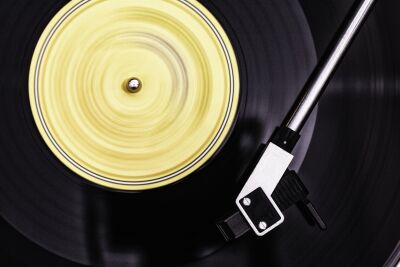 Spinning vinyl records (yellow)