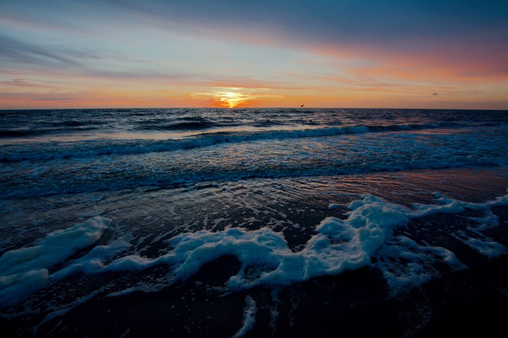 Zonsondergang aan zee op Texel