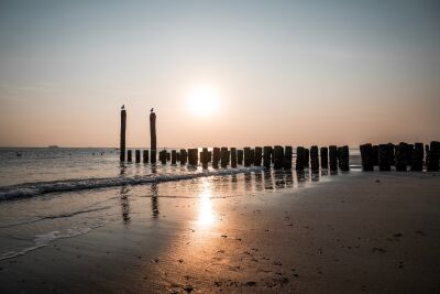 Sunset on the Beach with Breakwaters