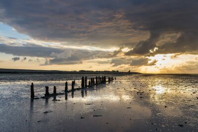 Zonsondergang boven het wad bij Wierum