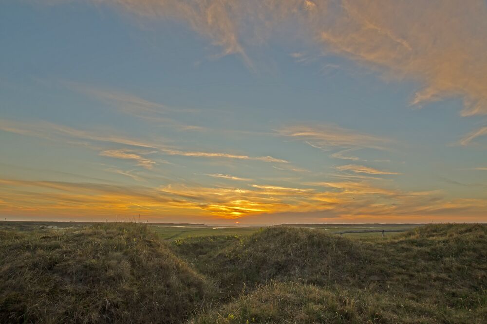 Zonsondergang boven De Slufter op Texel