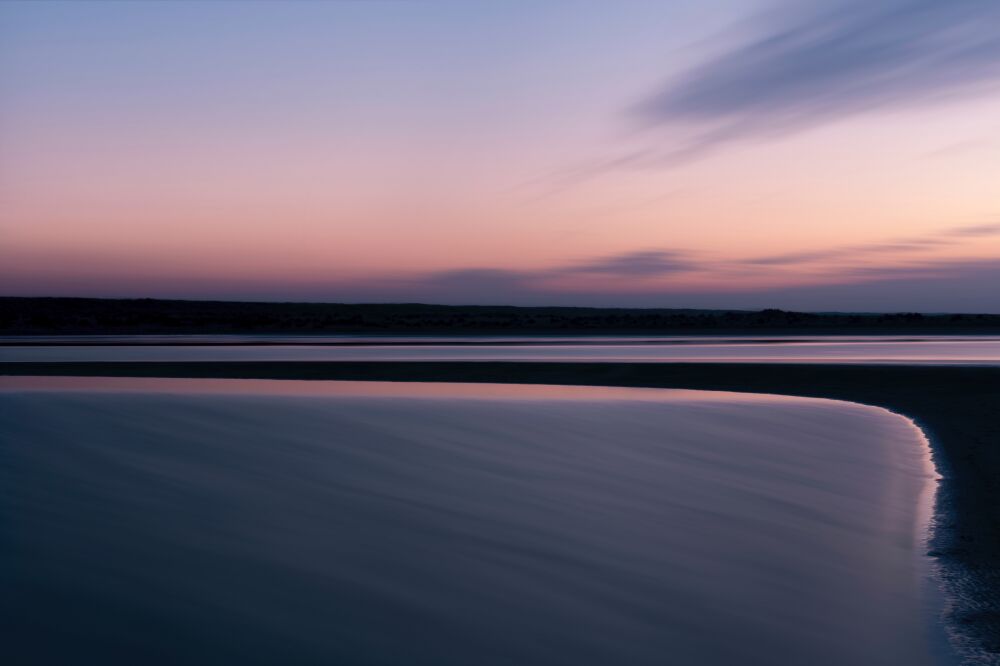 Zonsondergang gekleed in roze en paars