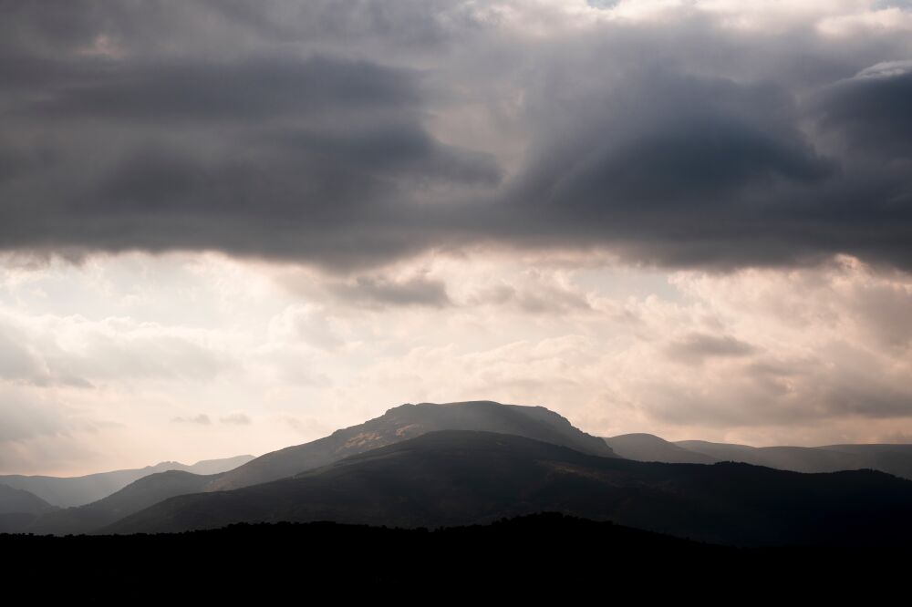 Dark Clouds Over the Mountains