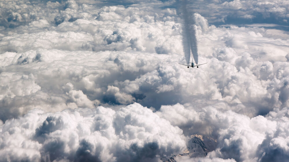 Contrails over a cloudy world