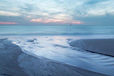 Zonsondergang aan het strand van Burgh-Haamstede