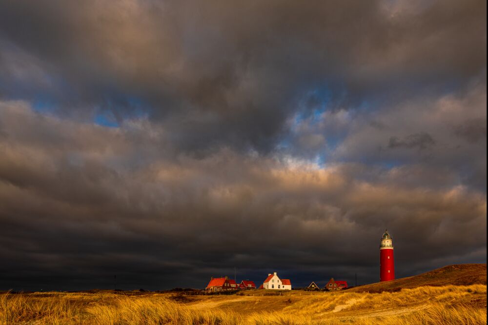 Hollandse ochtend sferen met de vuurtoren van Texel