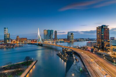 The iconic Erasmus Bridge and the skyline of Rotterdam at the Blue hour