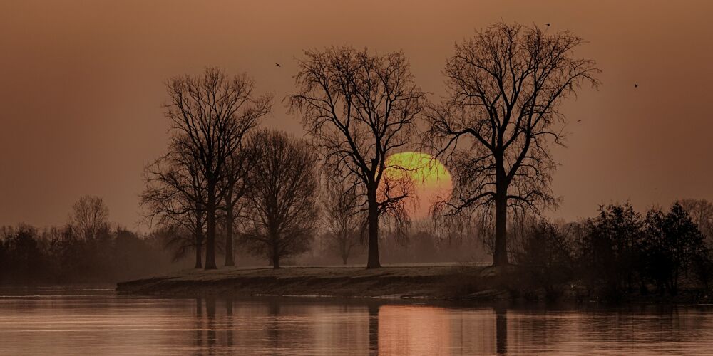 zonsopkomst bij de maas