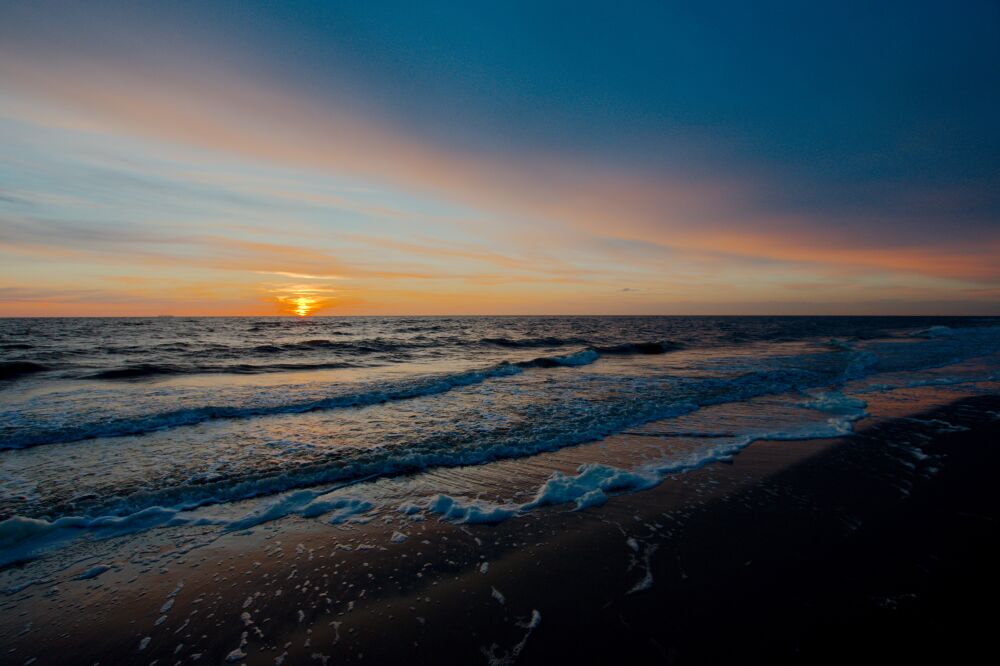 Zonsondergang aan zee op Texel